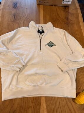 Roots Cream Quarter-Zip Sweatshirt with Beaver Canoe Logo